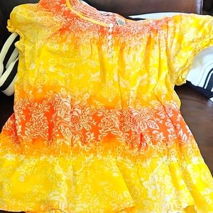 Medium sunset colored shirt